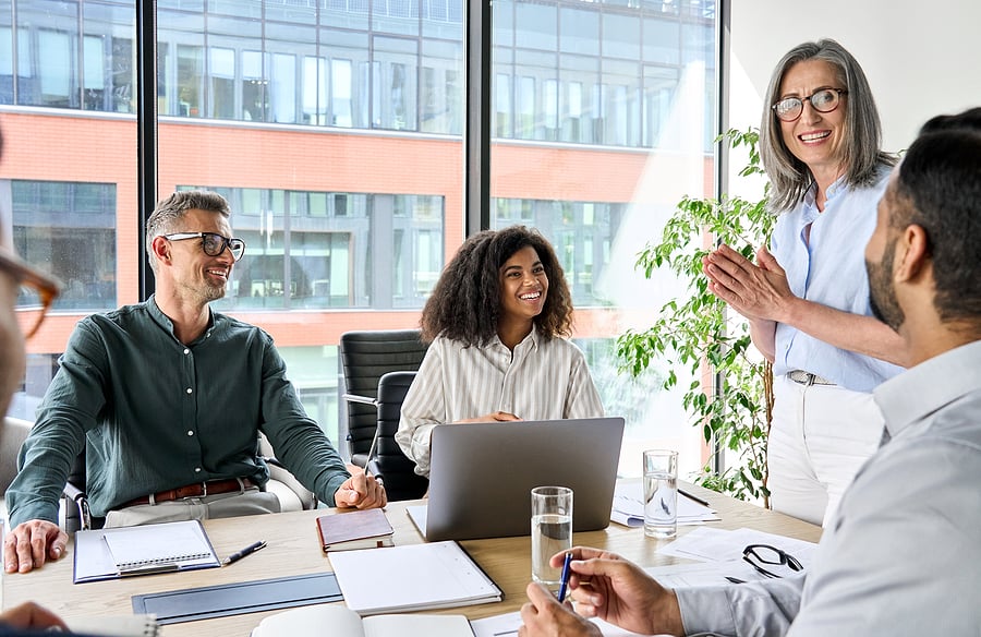 Your employees engaged in a collaborative team meeting – Titan Business Advisors